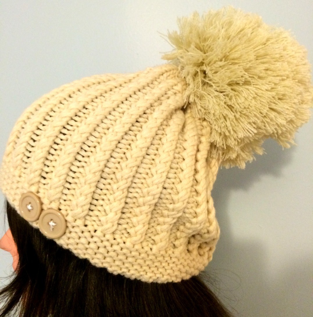 Off white beret with extra large pom pom