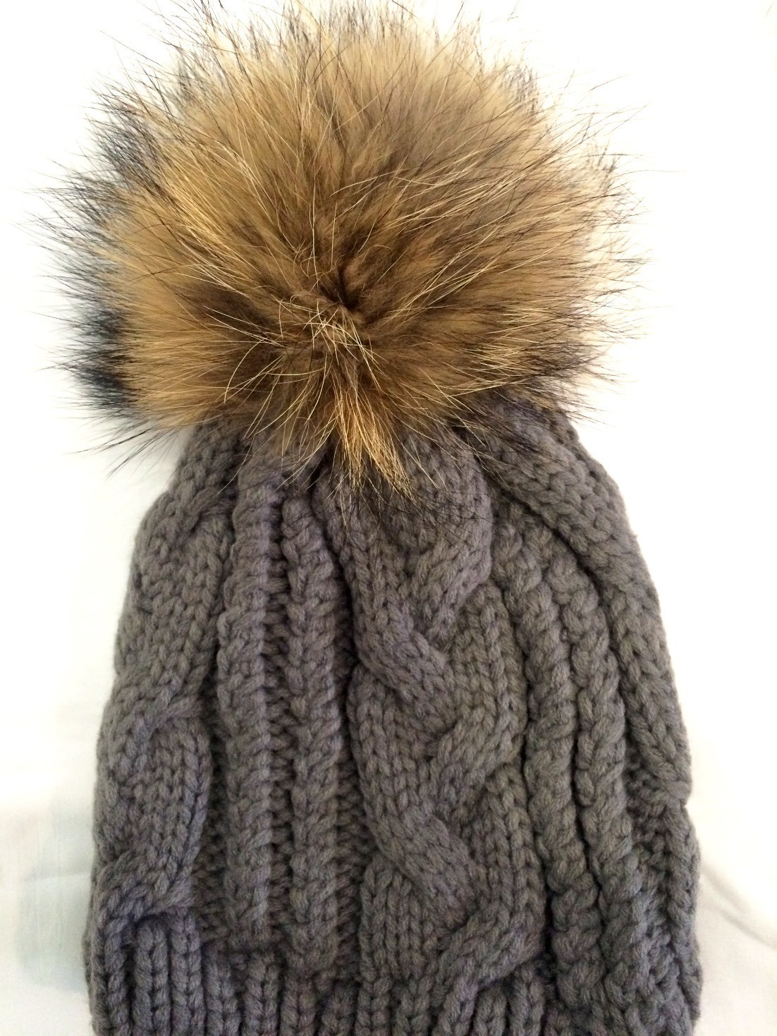 Gray cable knit fur pom pom hat