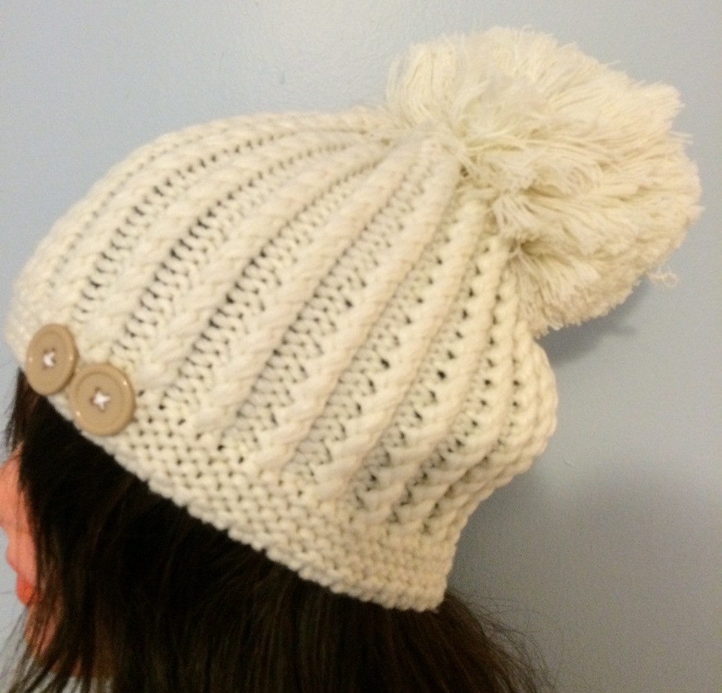 Cream beret with extra large pom pom