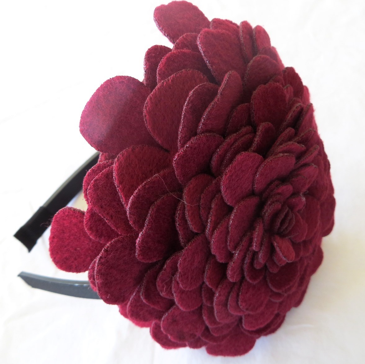 Dark raspberry large felt flower headband
