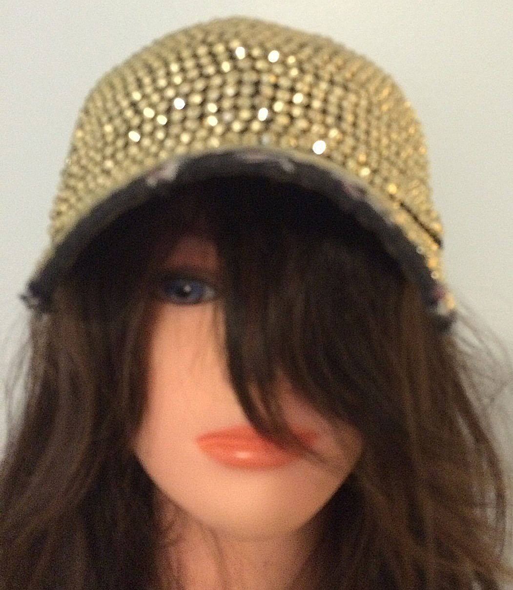 Black with gold bejeweled cap