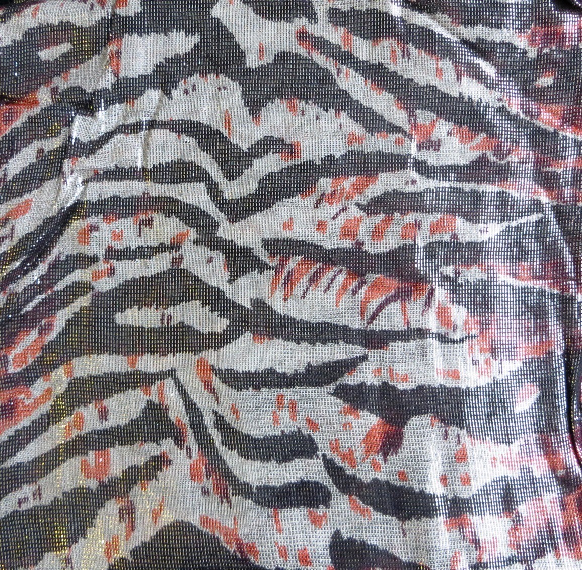 White, black, and orange animal print shimmering tichel