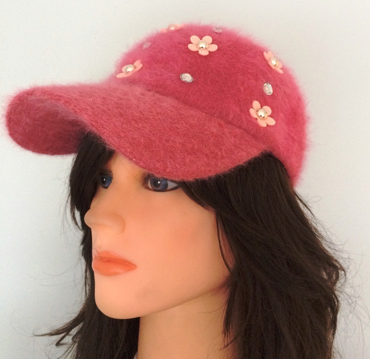 Pink furry bejeweled cap