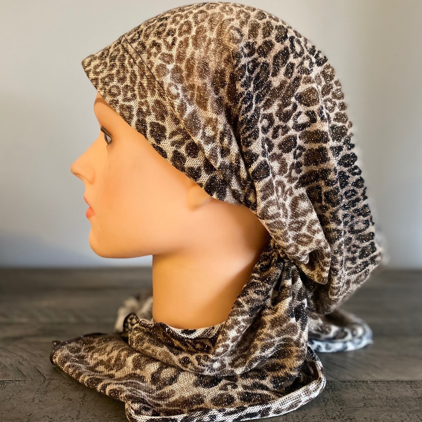 With gold shiimer animal print stretchy pretied tichel