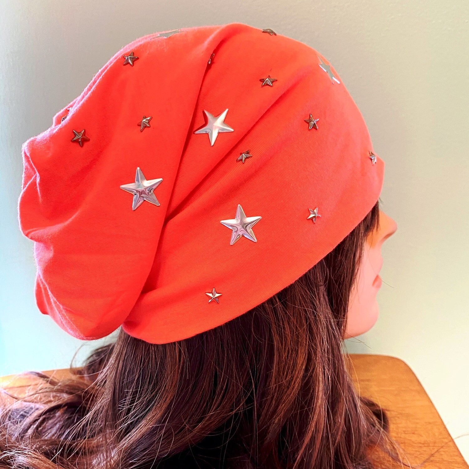 Neon orange beanie w/small stars