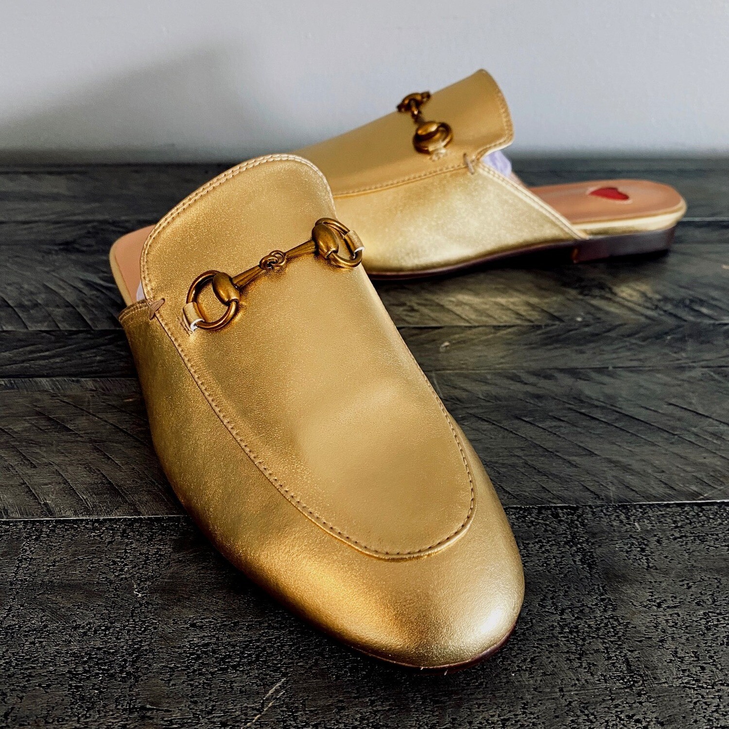 Gold metallic leather mules
