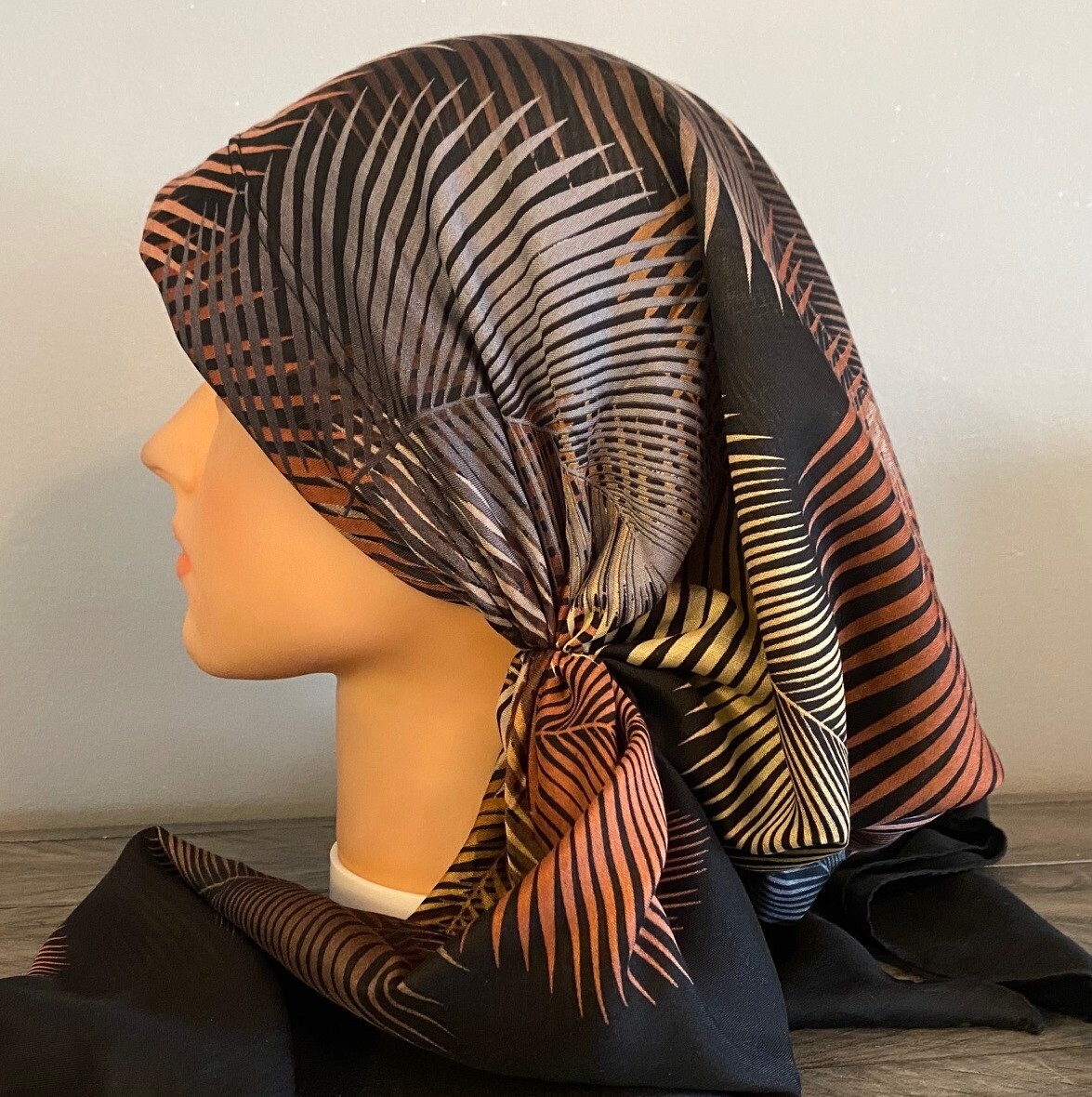 Black colored feathers pre-tied  w/band sewn in