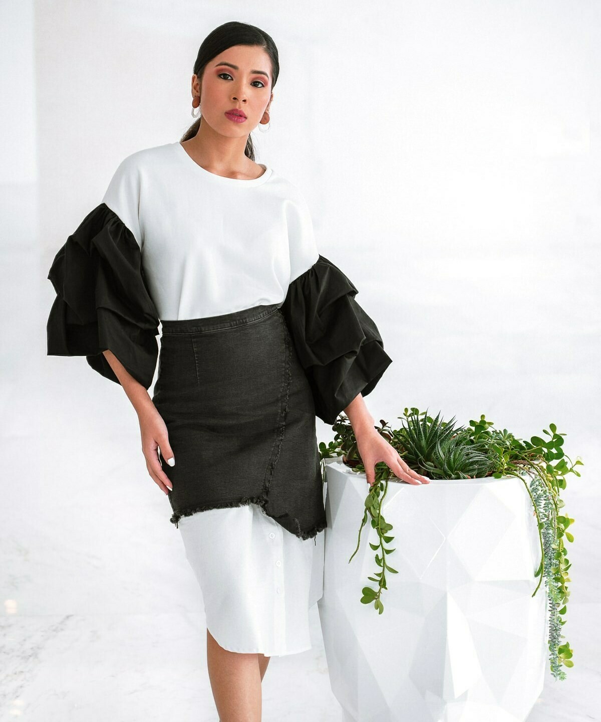 Black denim/white asymmetrical skirt