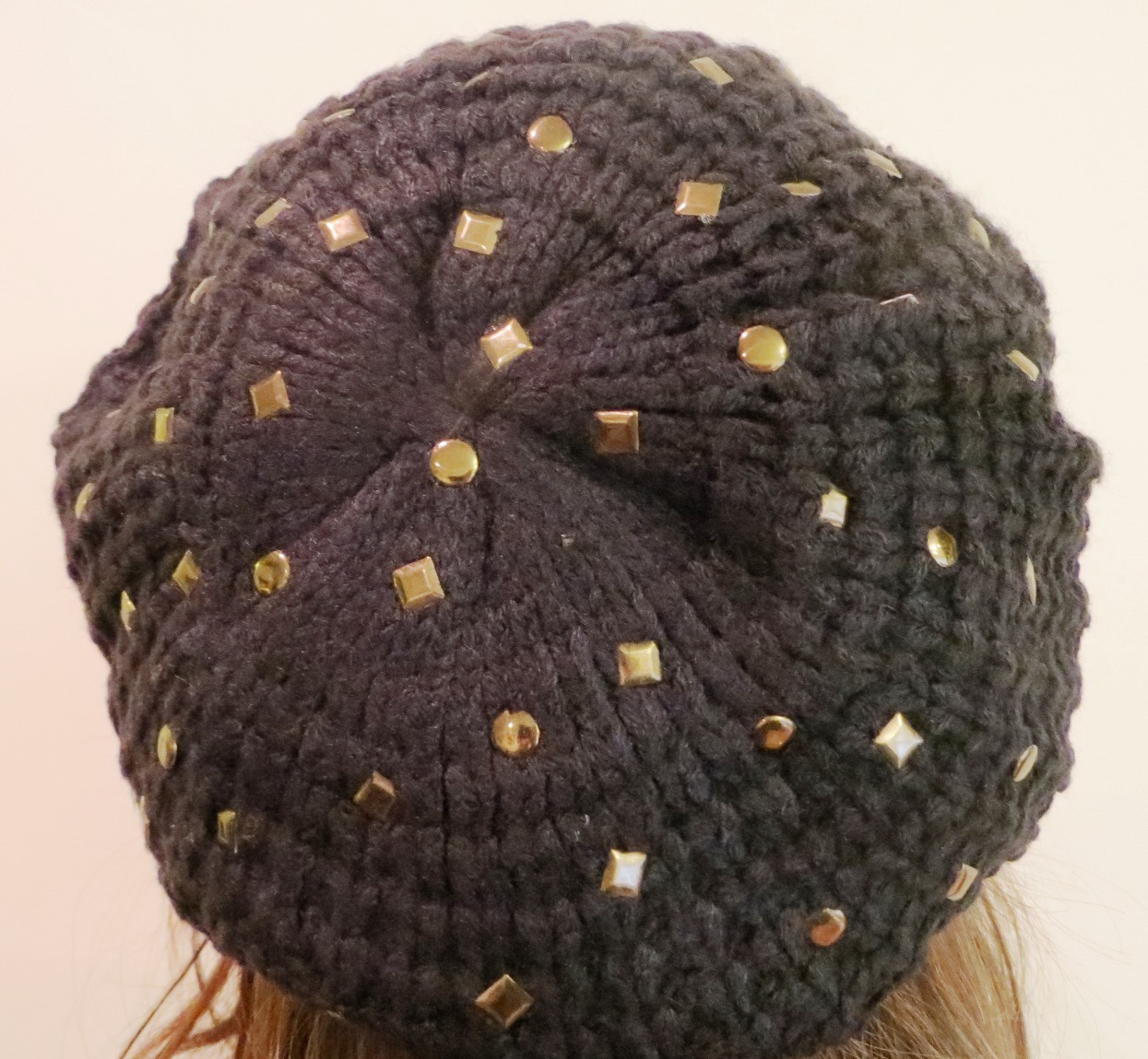 Black beret with metal