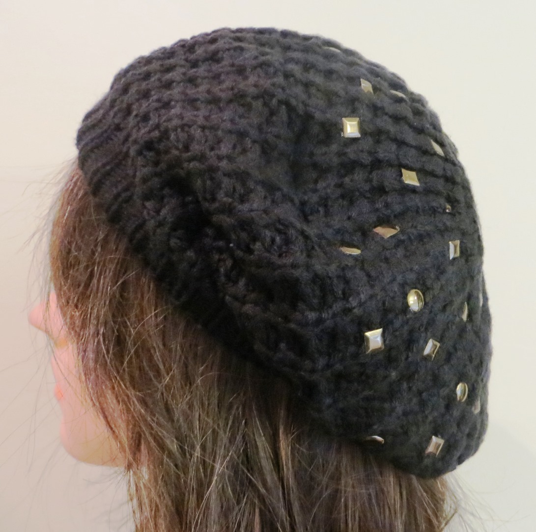Black beret with metal