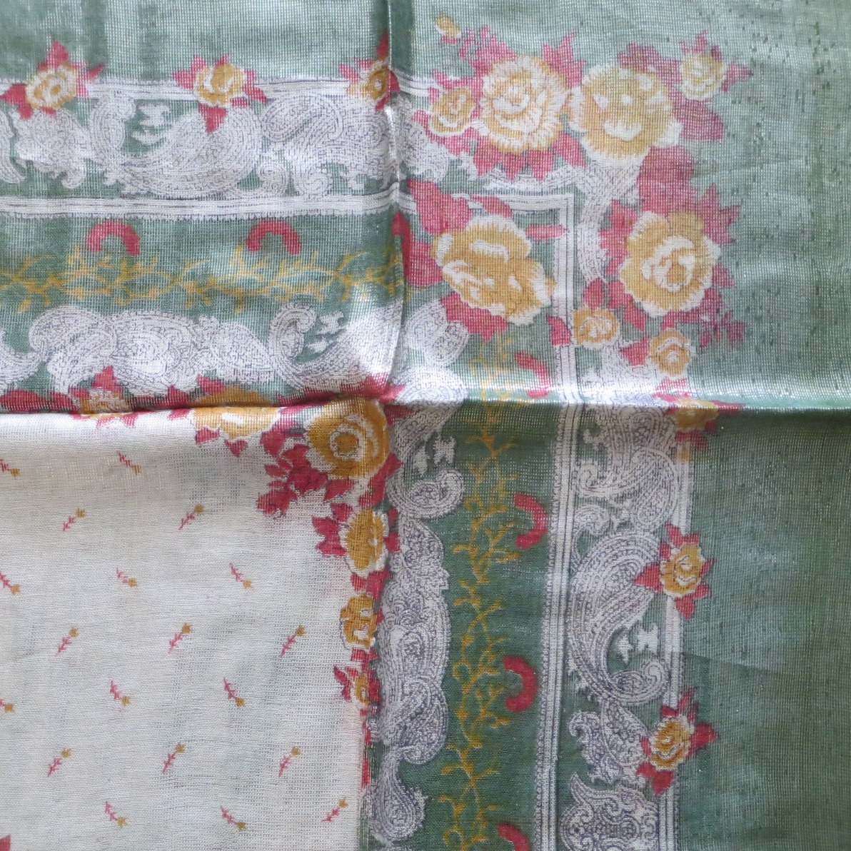 Green with bright flowers shimmering headscarve