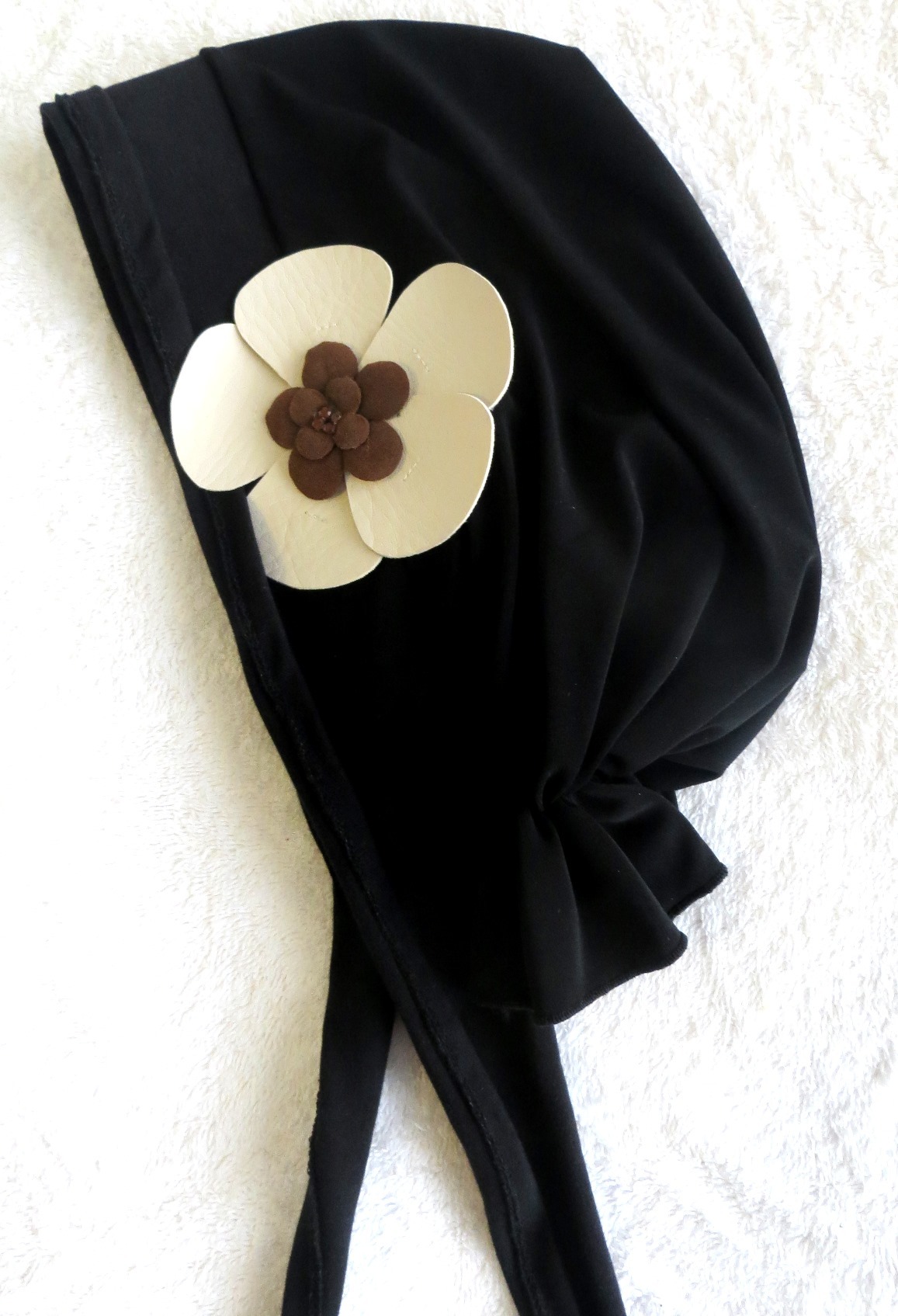 Self tie tichel black with off white flower