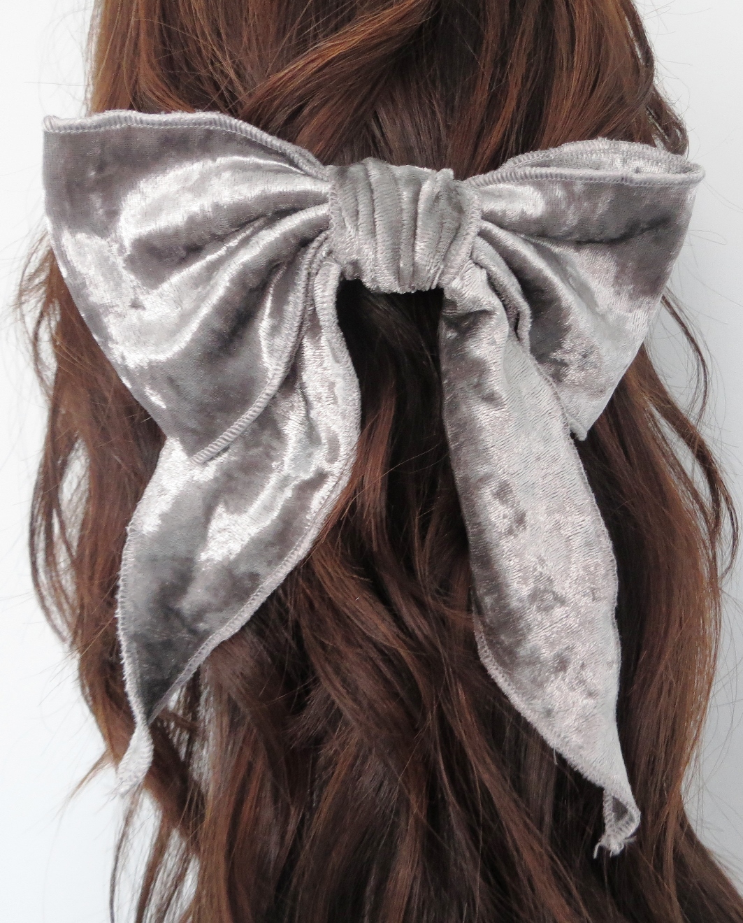 Silver velvet bow with tails