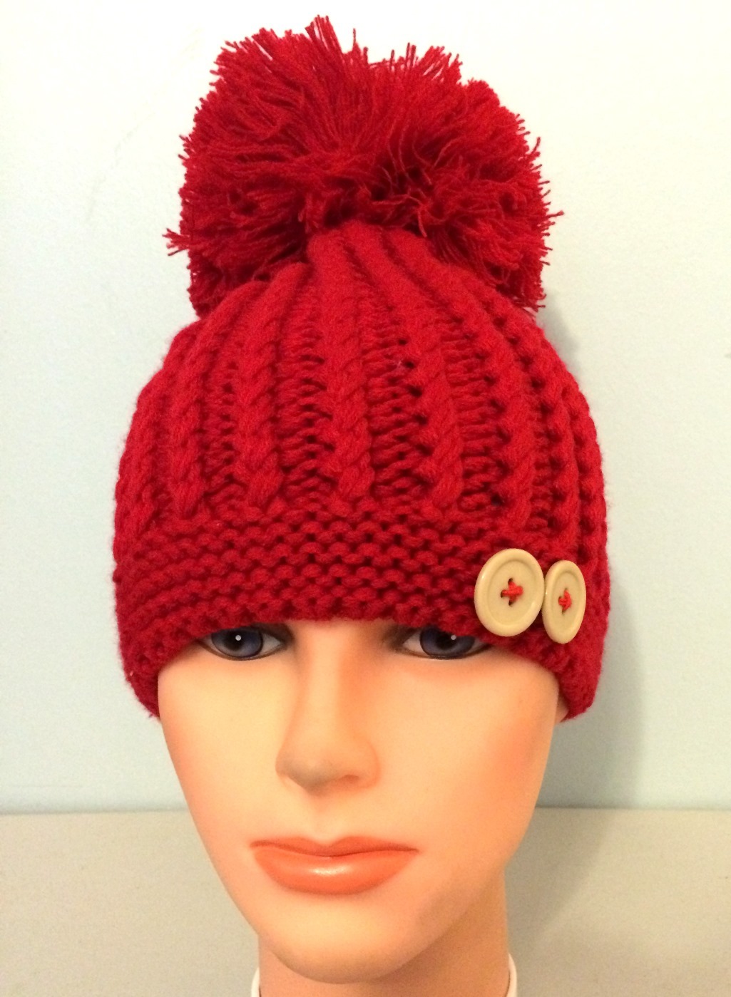 Red beret with extra large pom pom