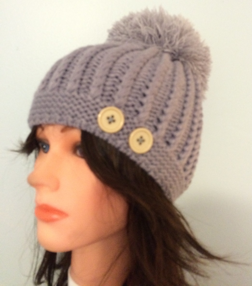 Gray beret with extra large pom pom