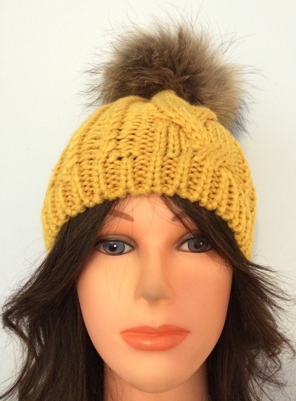 Mustard cable knit fur pom pom hat