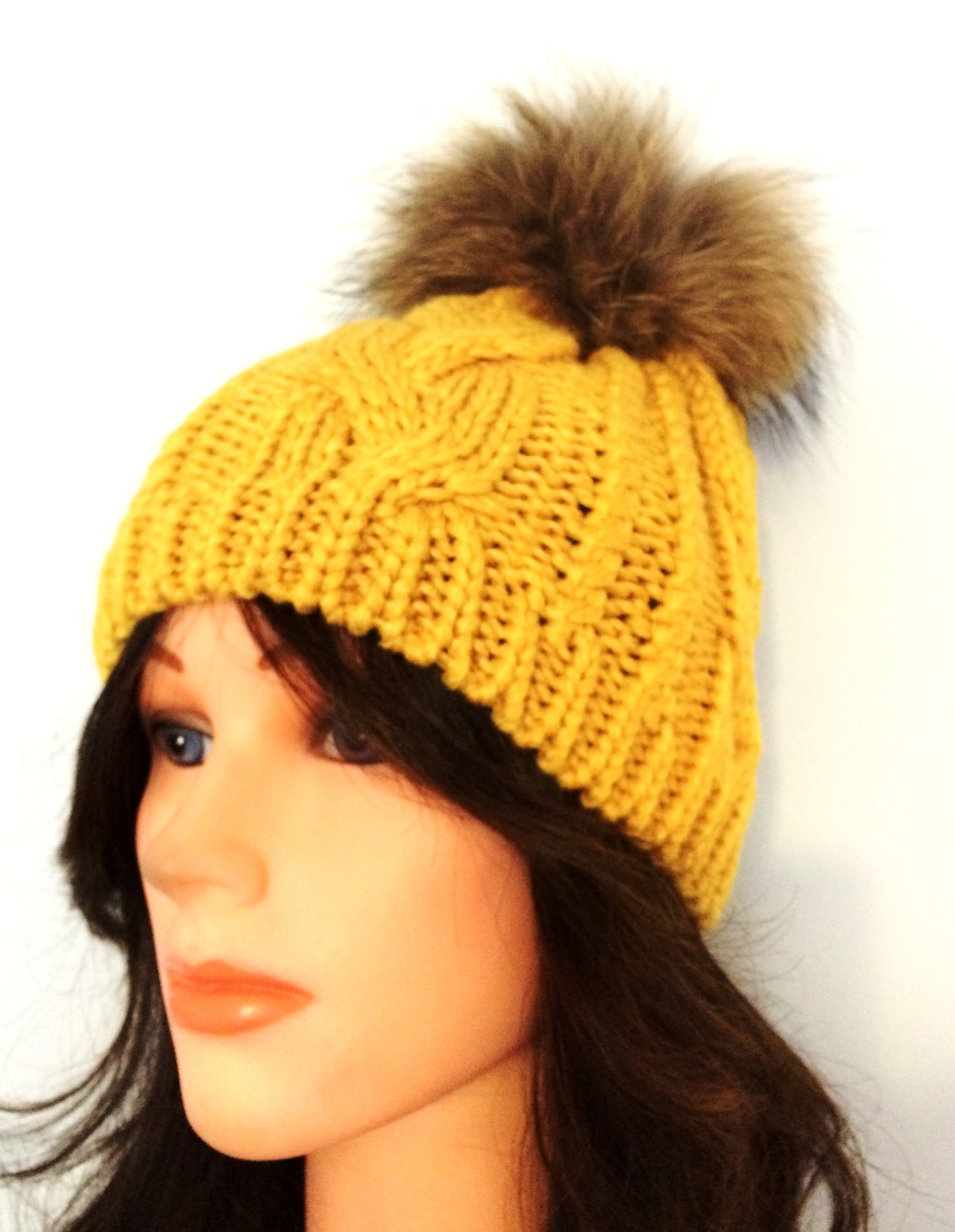 Mustard cable knit fur pom pom hat
