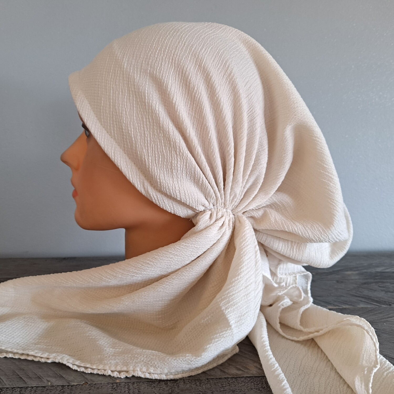 Light beige gauzy pre-tied tichel