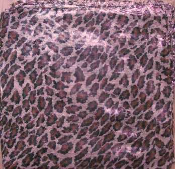 Leopard spots shimmering animal print tichel beige background