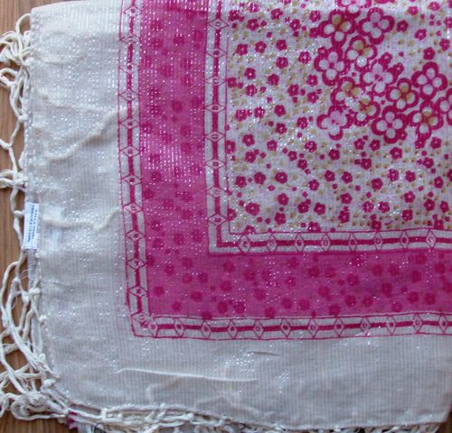 Pink flowers with thin silver lines off white background