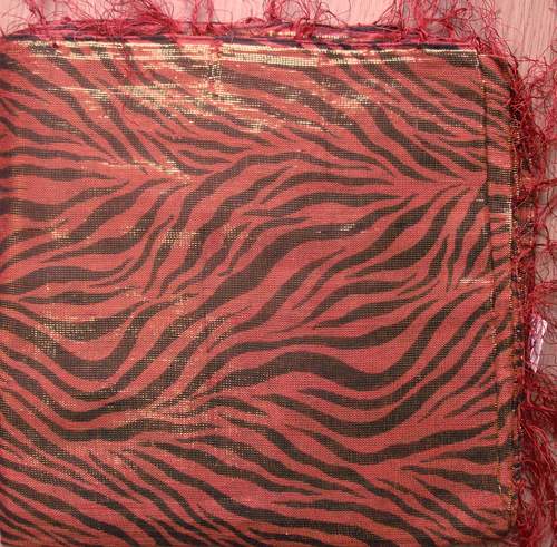 Orange shimmering animal print tichel