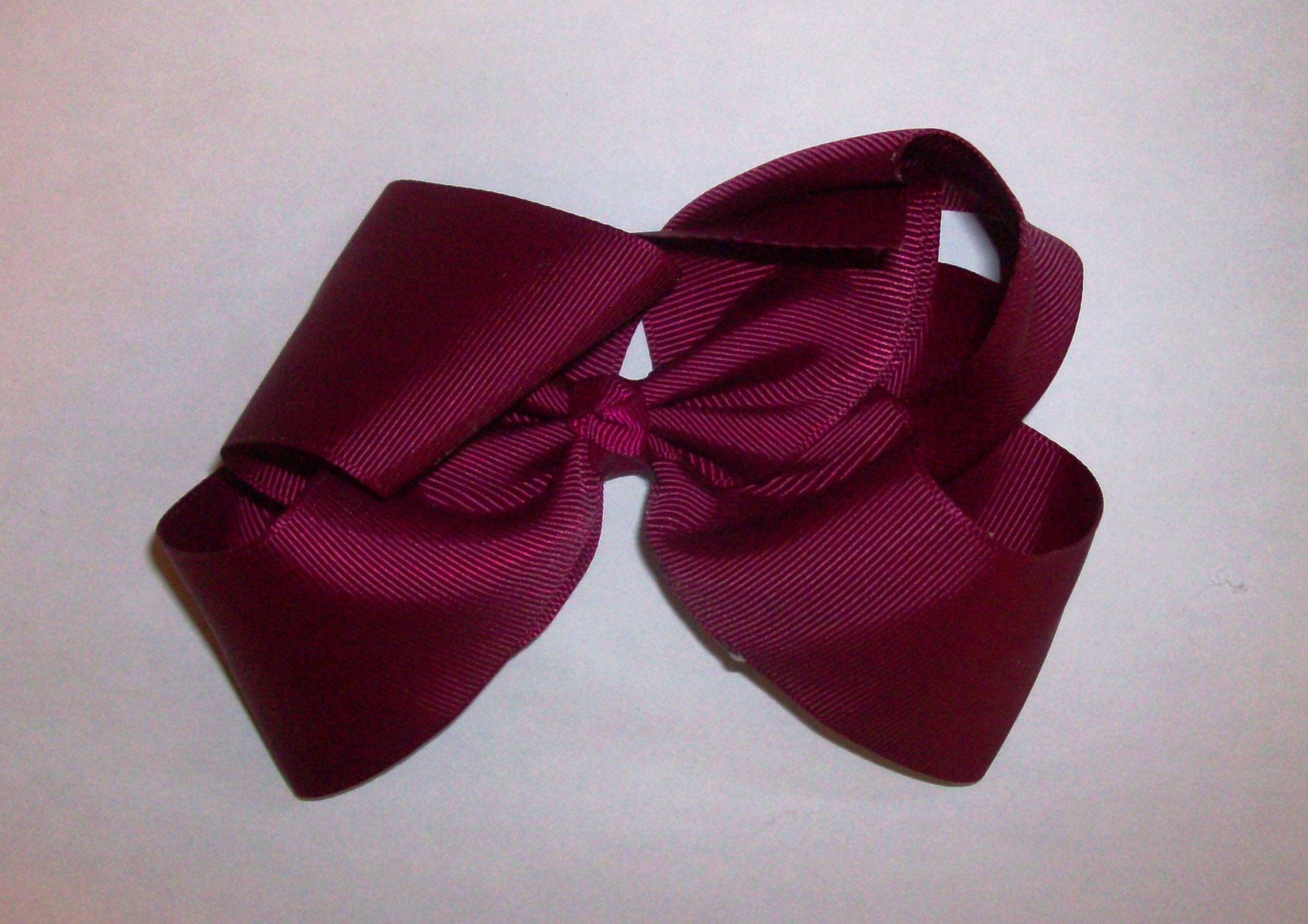 maroon bow