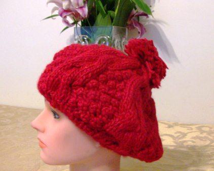 Red pom pom beret