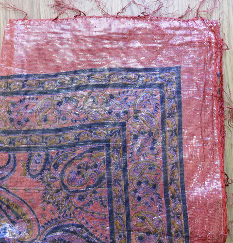 Dull reddish with silver shimmer tichel