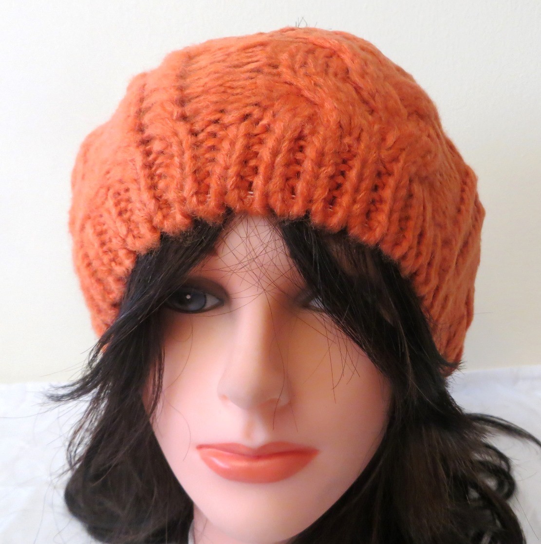 Orange pom pom beanie