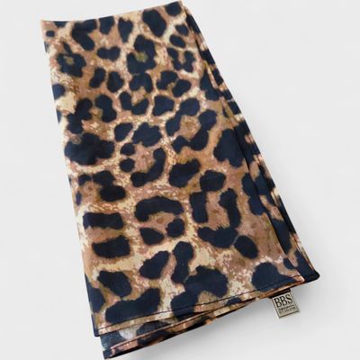 Brownishh/gold animal patterned small square tichel.