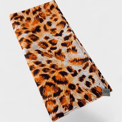 Tiger patterned small square tichel.