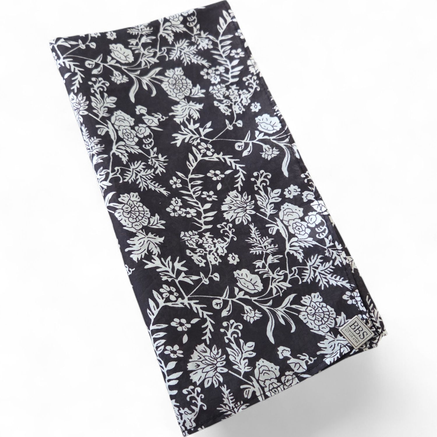 Black &amp; white floral patterned small square tichel.