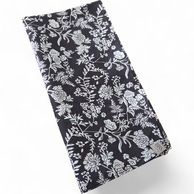 Black &amp; white floral patterned small square tichel.