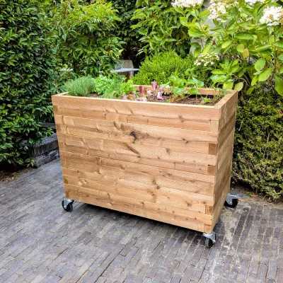 Wooden raised garden bed on wheels