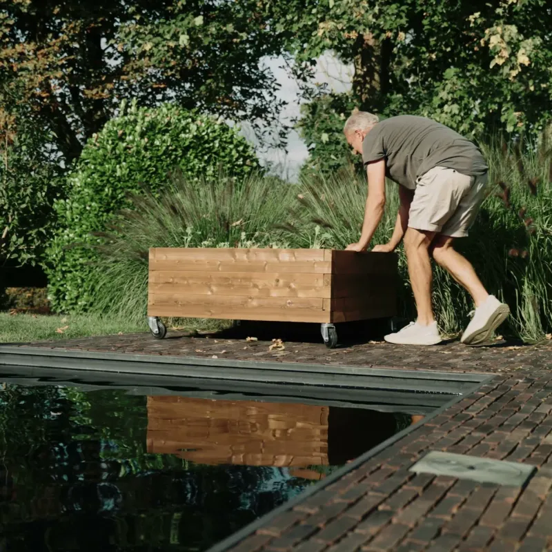 Moveable low wooden raised garden bed on wheels - 107x107x37.5 cm | Ideal for urban gardening &amp; patios
