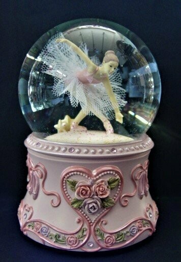 Bola de cristal con música y bailarina