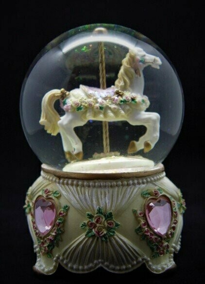 Bola de cristal de caballo de carrusel con música