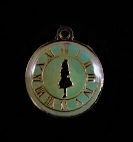 Reloj de "Alicia en el país de las maravillas" verde y dorado