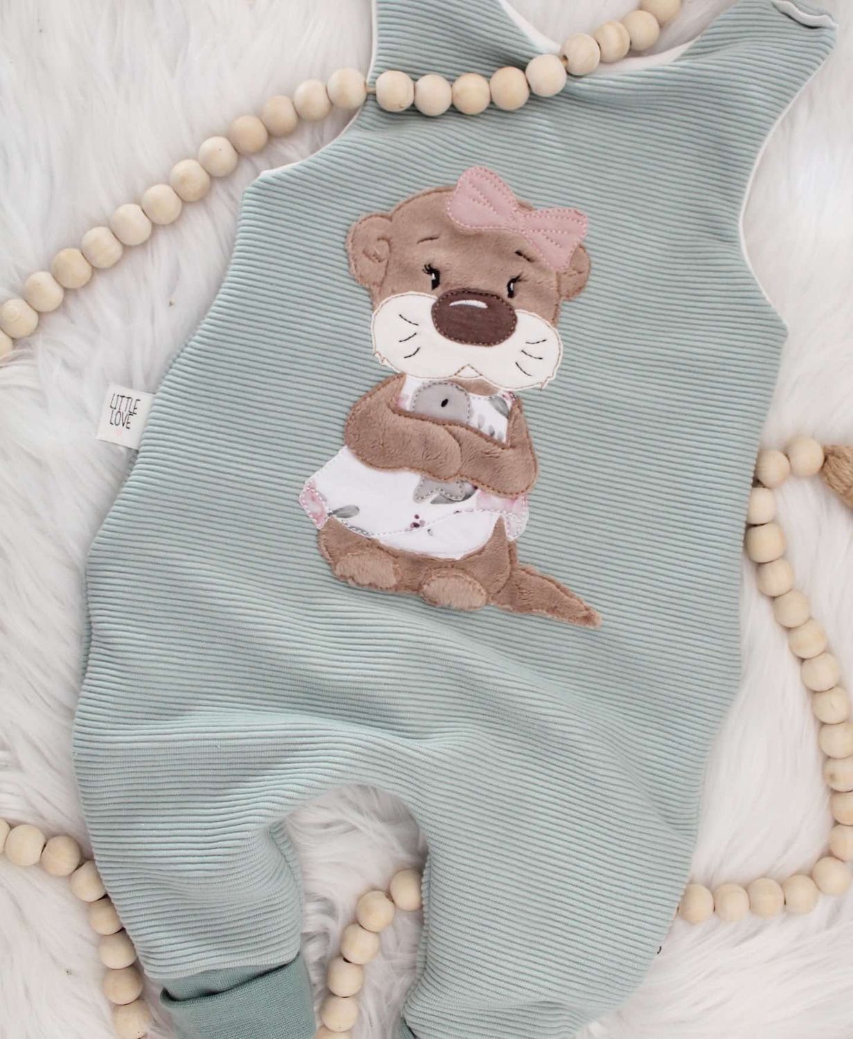 Strampler Ottermädchen