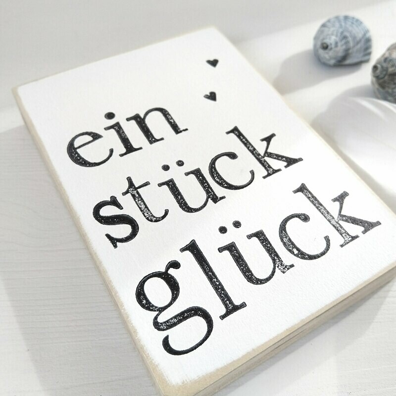 Schild "ein Stück Glück"