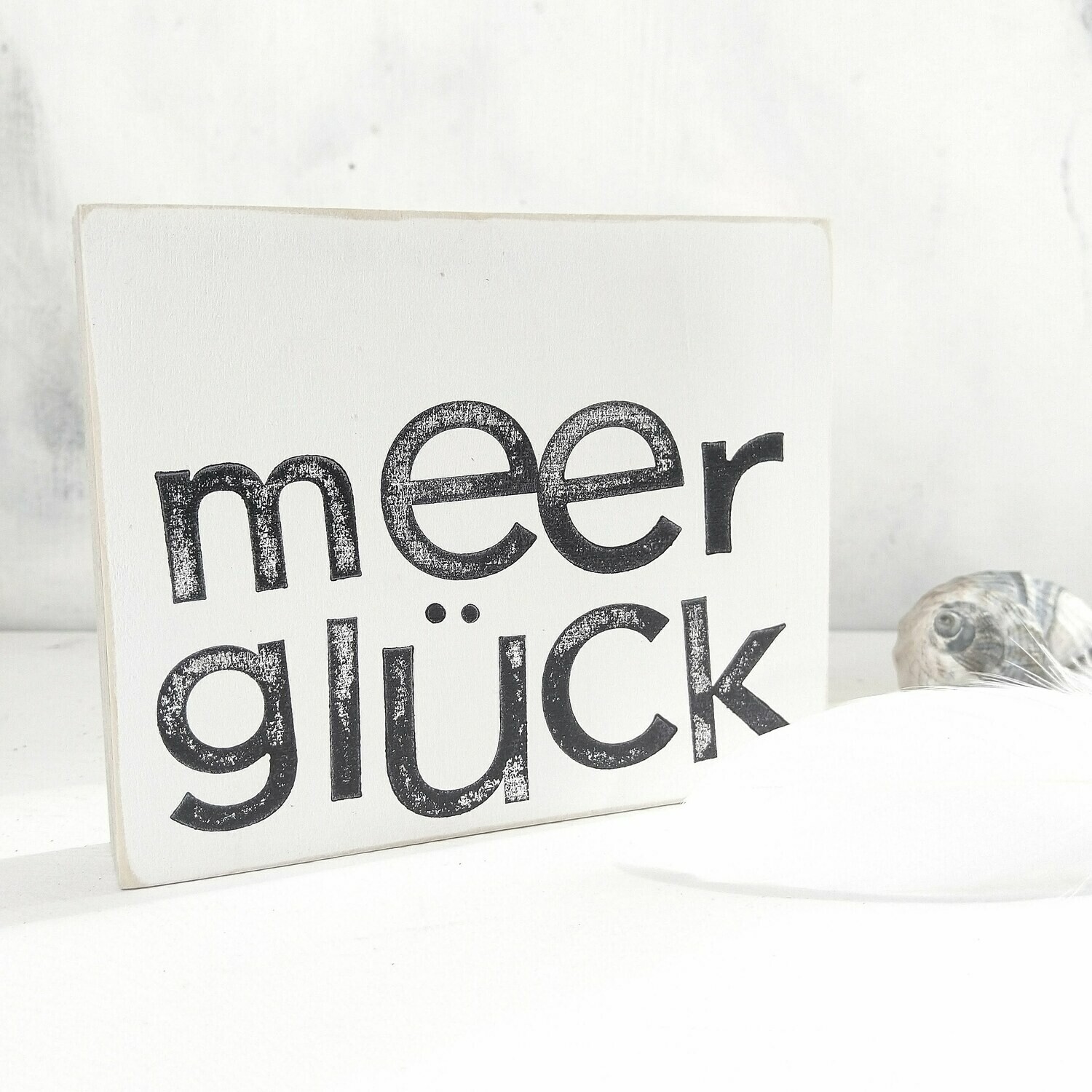 Schild "Meer Glück"