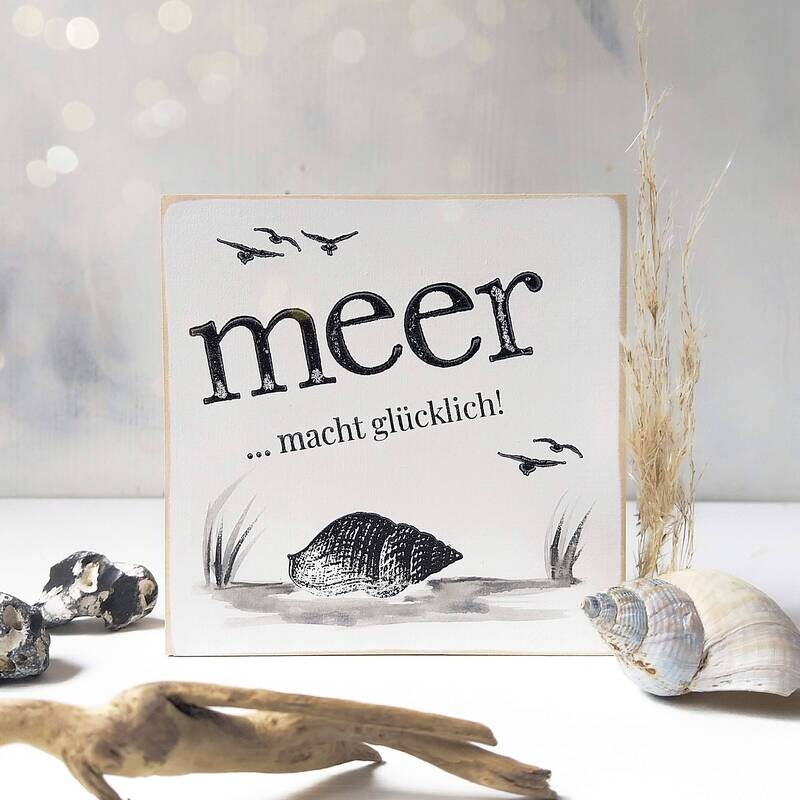 Schild "Meer macht glücklich"