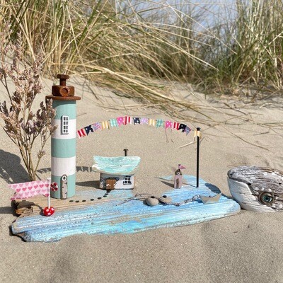 Treibholzinsel mit Glubschwal