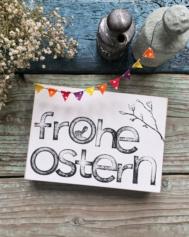 Schild „Frohe Ostern“