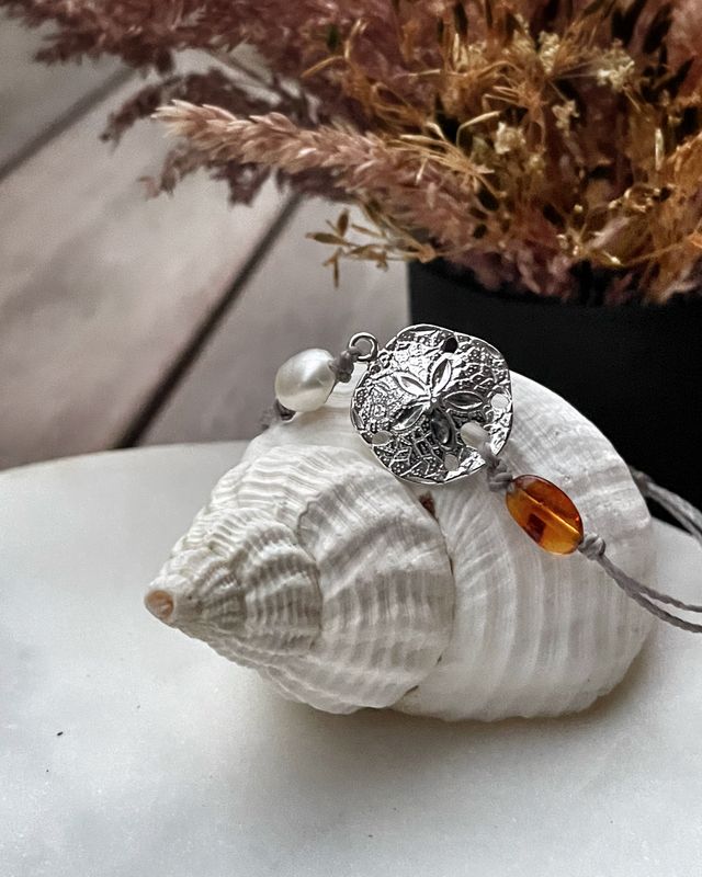 Glücksarmband mit 925er Silber Glücksarmband mit 925er Silber "Sanddollar"