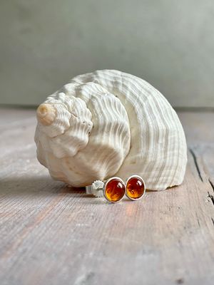 Kunst mol kieken! 
Handgemacht: 925er Silber/Bernstein Ohrstecker