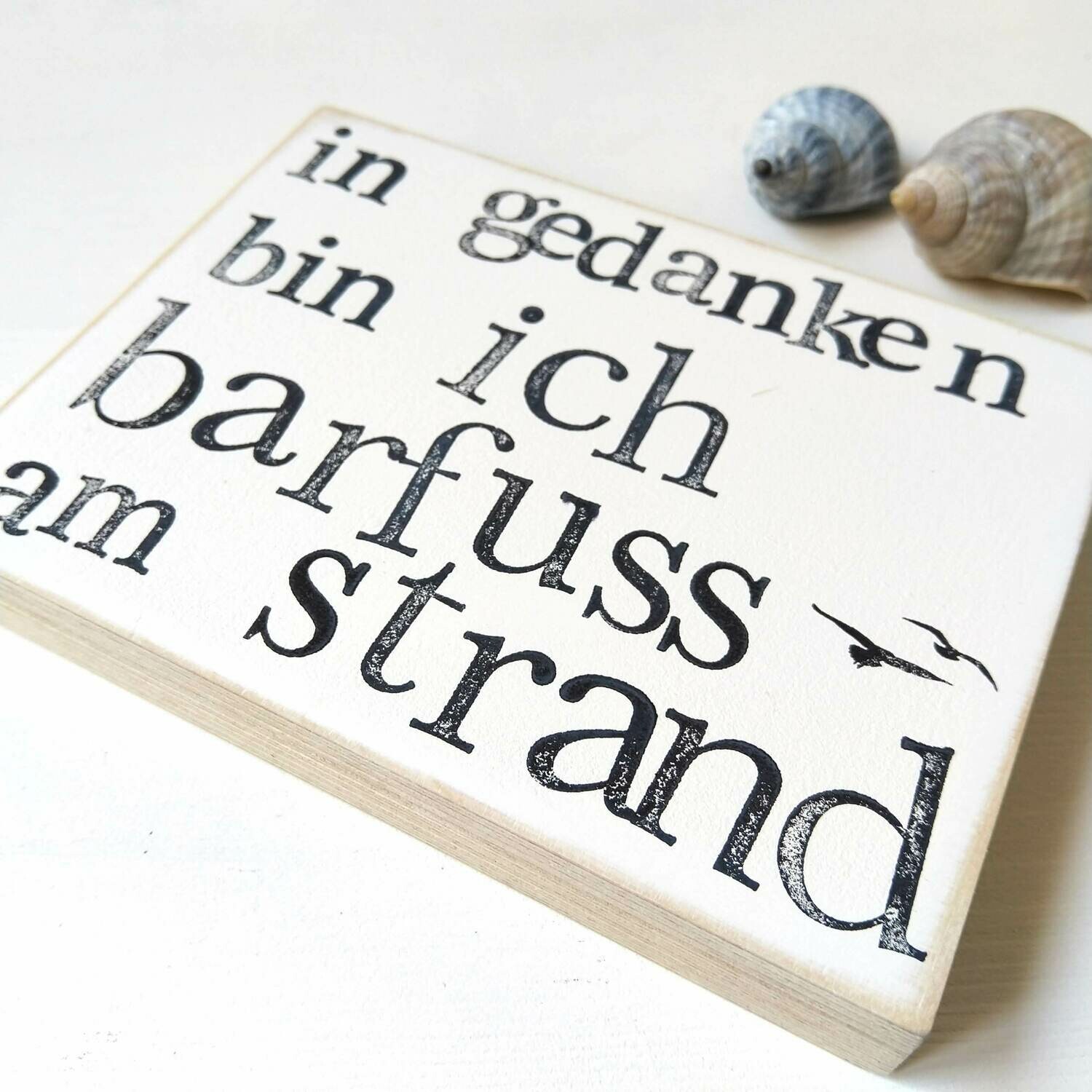Schild "In Gedanken bin ich barfuss am Strand"