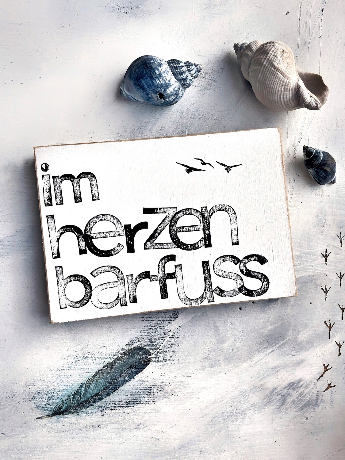 Schild „Im Herzen Barfuß“