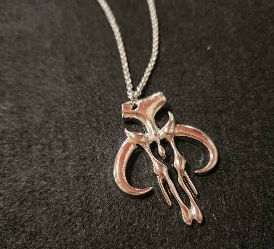 Metal bone shaped pendant necklace, hairstick, or keychain