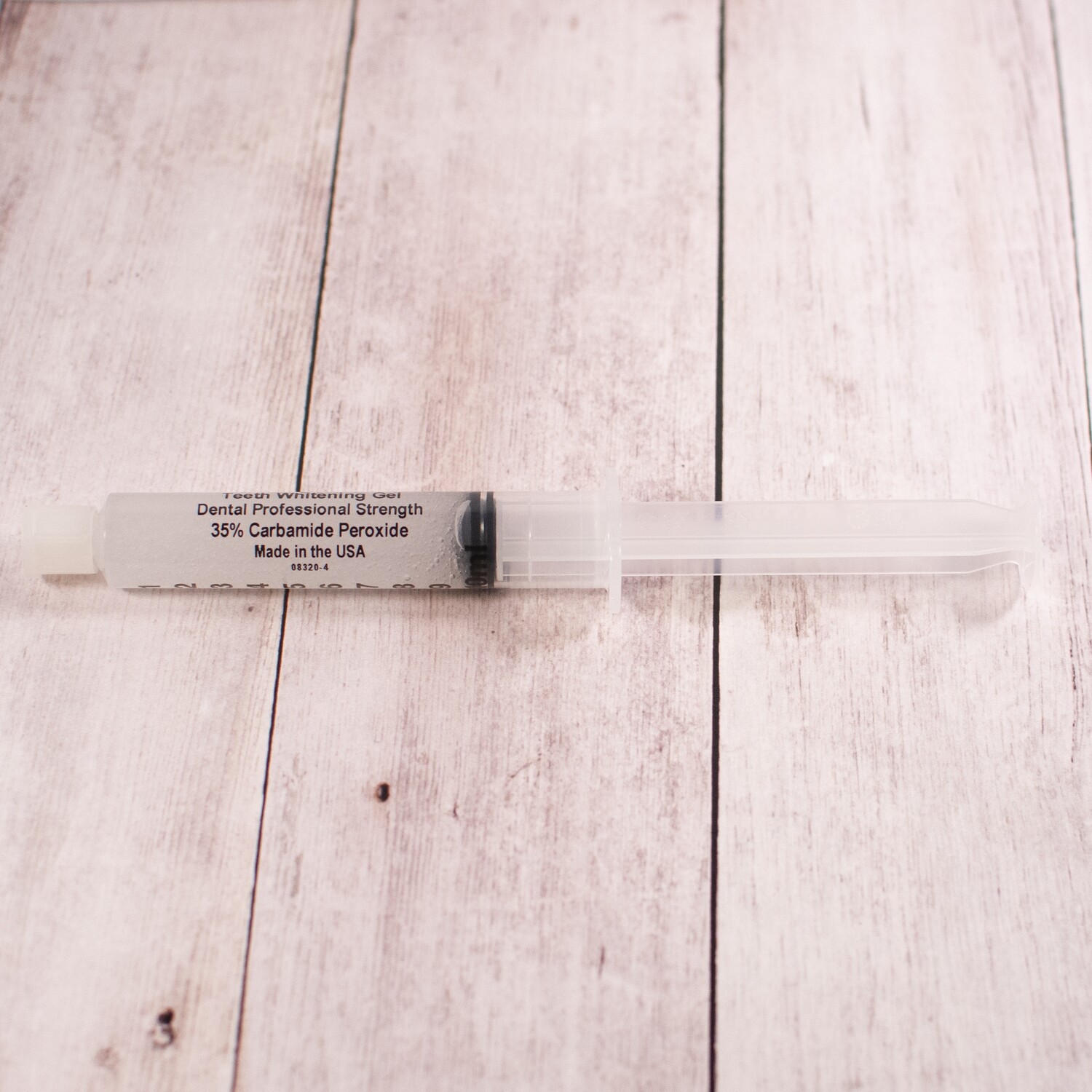 Syringe of Teeth Whitening Gel
